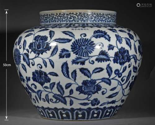 A MING DYNASTY XUANDE BLUE AND WHITE TANGLED LOTUS JAR