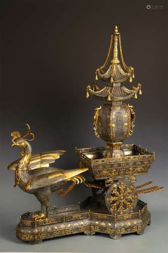 A TANG DYNASTY GILDED PHOENIX PULLING CART ORNAMENT