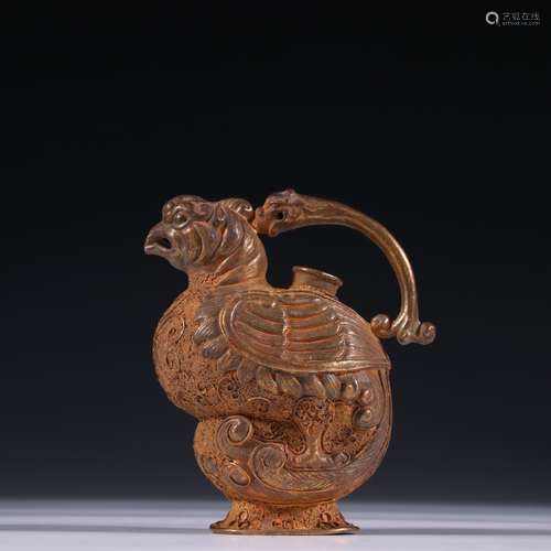 A HAN DYNASTY SILVER GILDING FRY BEAD BIRD SHAPED HANDLED ZU...