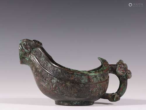 A WARRING STATES PERIOD BRONZE BEAST PATTERN WINE VESSEL YI