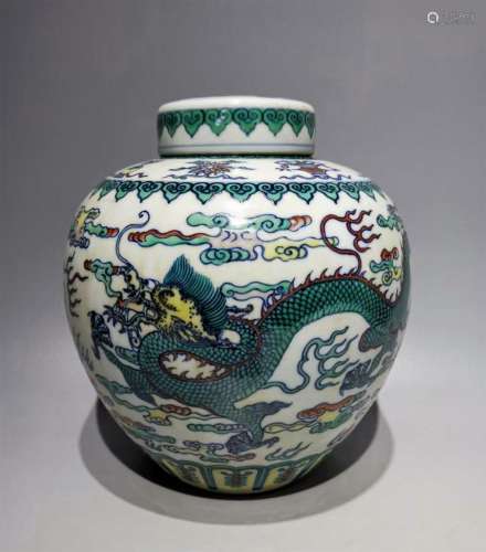 A QING DYNASTY QIANLONG DOU CAI DRAGON DESIGN TEA JAR