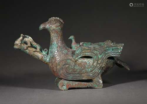 A WARRING STATES PERIOD BRONZ PHOENIX ORNAMENT