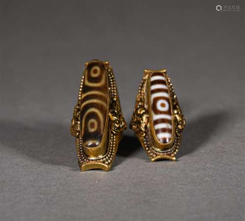 A HAN DYNASTY INLAYED DZI RING