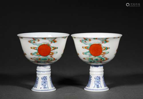 A PAIR OF QING DYNASTY DOU CAI HIGH FOOT CUPS