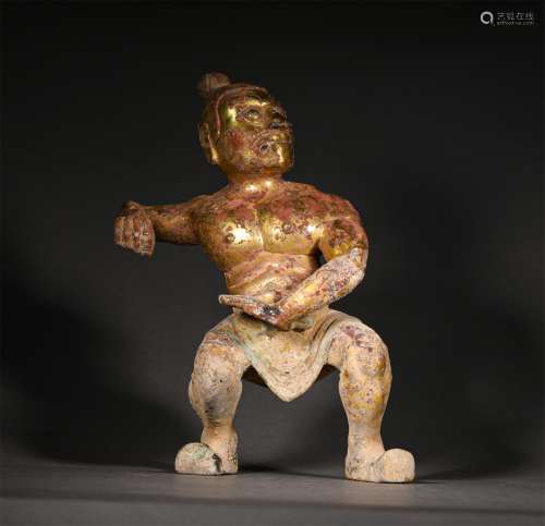 A TANG DYNASTY BRONZE GILDED WARRIOR STATUE