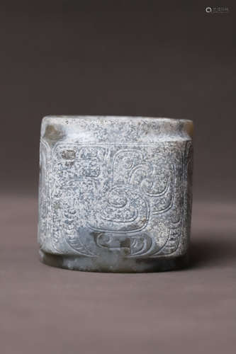 A Carved Jade Cong Ornament