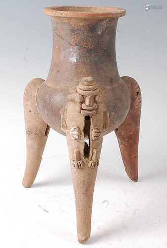 * A pottery vessel, having a waisted neck to a bulbous lower...