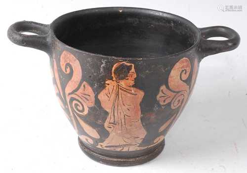 * A pottery skyphos, having typical twin handles, the black ...