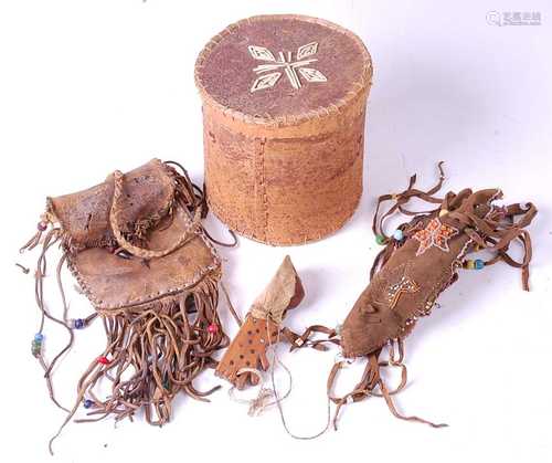 * A birch-wood box and cover of cylindrical form, containing...