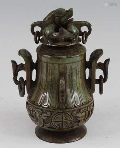 * A Chinese carved jadeite covered jar and cover of Archaic ...