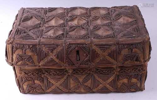 * A late 19th century Peruvian cowhide trunk, of rectangular...