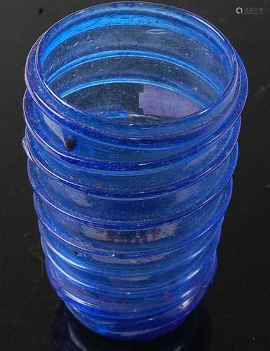 * A hand blown cobalt blue vessel, with spiralling helix typ...