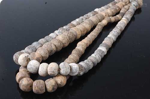 * A graduated hardstone bead necklace, largest bead 2cm, tog...