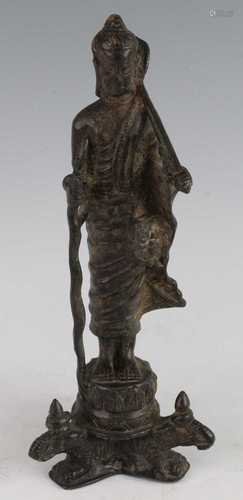 * A Chinese cast bronze figure of the Buddha Shakyamuni, mod...