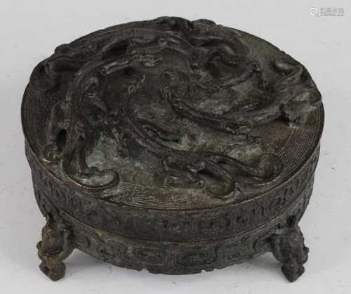 * A Chinese cast bronze box of Archaic form, the removable c...