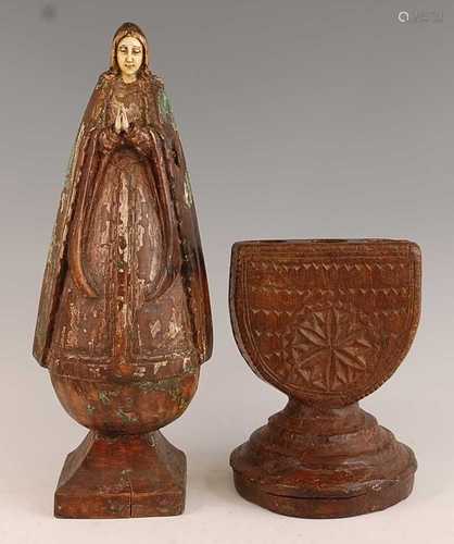 * A large carved limewood? figure of The Madonna in standing...