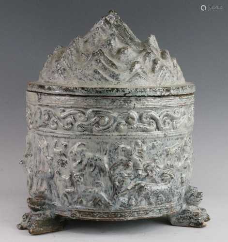 * A Chinese green glazed pottery incense burner (Boshan Lu),...