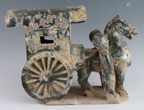 * A Chinese green glazed terracotta Mingqi cart, with a sing...