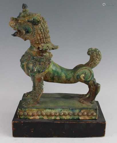 * A Chinese green glazed pottery figure of a Fu Lion, modell...