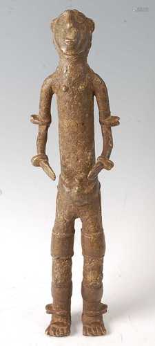 * A cast copper alloy figure of a male Royal in standing pos...