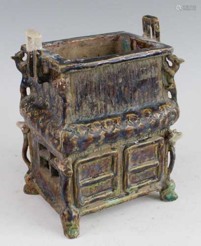 * A Chinese sancai glazed pottery incense burner, of rectang...