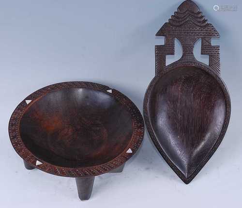 A Fijian Cava bowl of circular form, having a chip carved an...