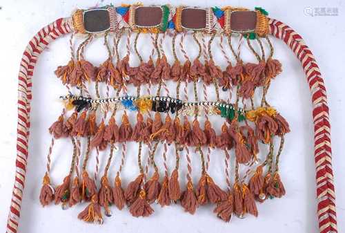 A Berber belt, the cord waistband woven with silk, having fo...