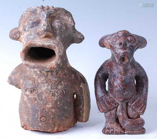 * A terracotta zoomorphic figure, in standing pose with elon...