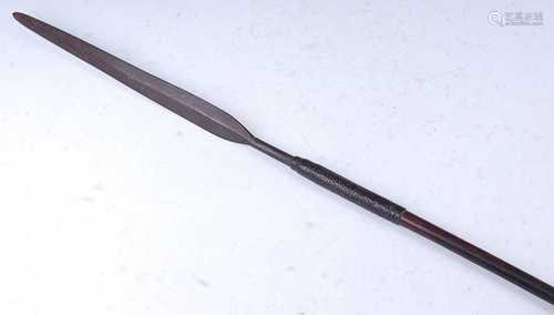 An African war spear, having a 35cm flattened leaf shaped ti...