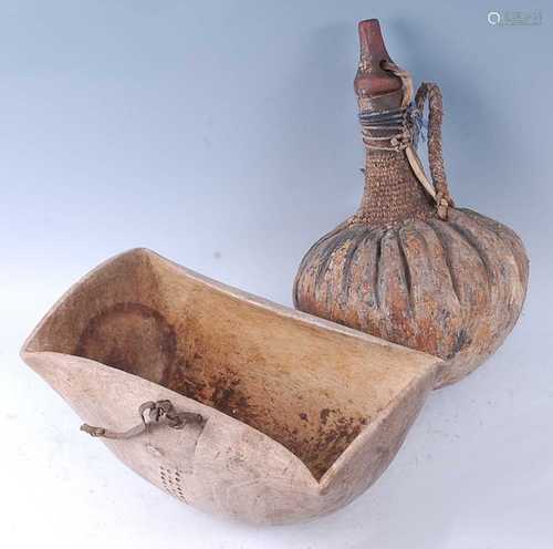 An African husk/calabash gourd drinking vessel, having a wov...