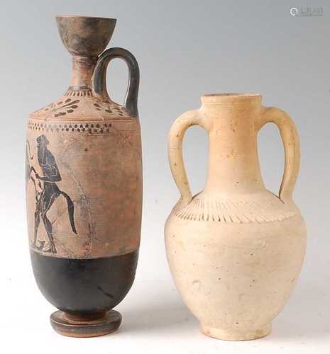 * A terracotta ewer of Ancient form, having a flared rim to ...