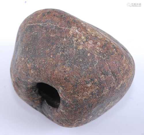 A stone mace head, of near globular form with central apertu...