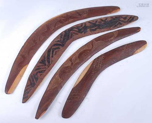 A Mulga wood (Acacia aneura) boomerang, with naive carved de...