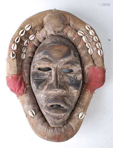 * An initiation mask, in original padded fabric surround mou...