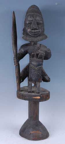 A large carved Shango form figure of a hunter / warrior, mou...