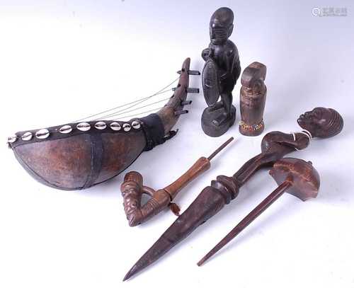 * A collection of six tribal items, various African Peoples,...