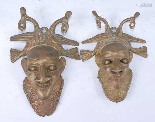 A near pair of lost wax brass mask form castings, each in th...