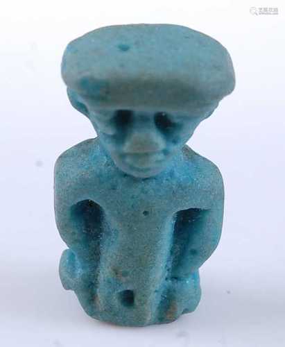 An Egyptian green glazed faience amulet form diety bead, pos...