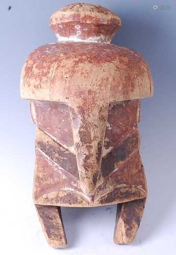 * A large carved and polychrome painted ritual / rites mask,...