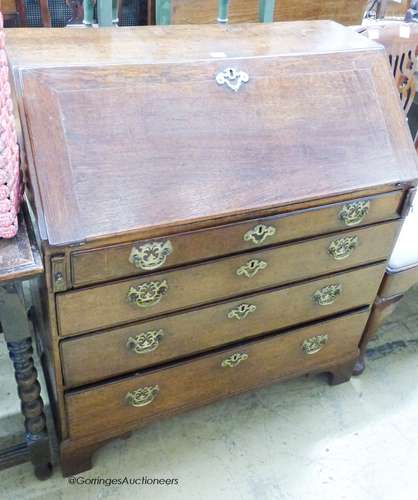 A George III oak bureau, width 87cm, depth 47cm, height 99cm