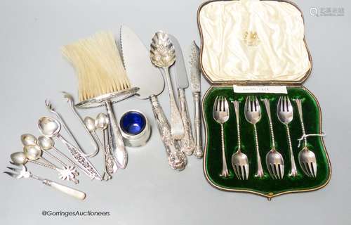 A set of six Victorian silver cake forks, a George III silve...