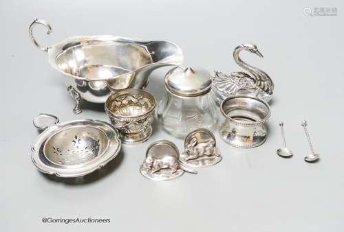 A silver sauceboat, a pair of G. Brace & Co Ltd animal menu ...