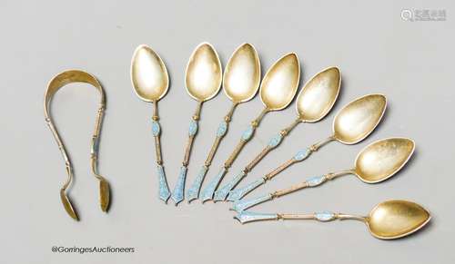 A set of eight Norwegian white metal and enamel coffee spoon...