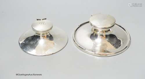 Two George V silver mounted capstan inkwells, marks rubbed, ...