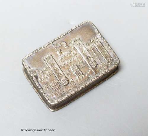 An early Victorian silver rectangular castle top vinaigrette...