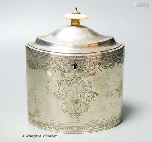 A George III engraved oval tea caddy, with ivory knop, no ke...