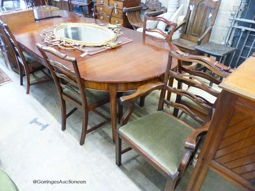 A reproduction George III Style mahogany D-end extending din...