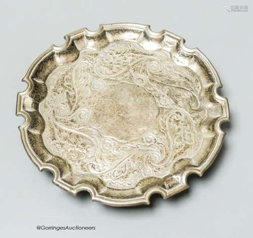 A George II silver salver with later embossed decoration, Ro...