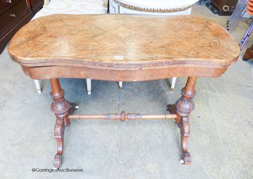 A Victorian inlaid figured walnut serpentine folding top car...