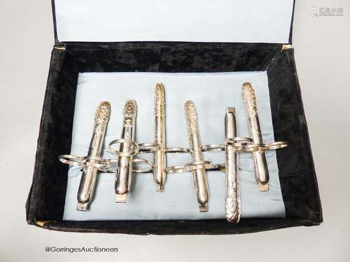 A set of six late Victorian silver asparagus eaters, by Atki...